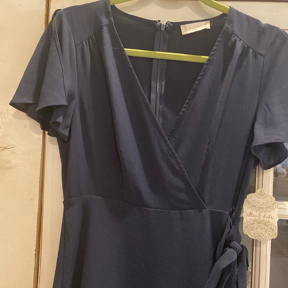 NWT Altar'd State Navy Blue Faux Wrap Dress V
Neck size Medium - Picture 3 of 10